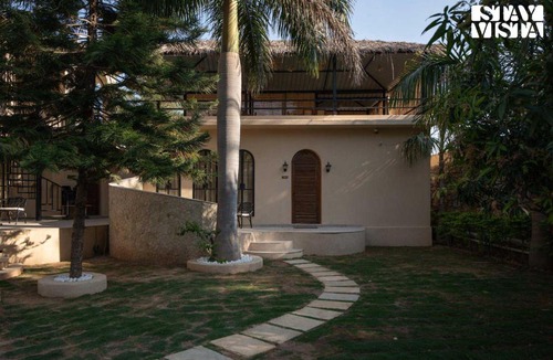 Bedla Villa | StayVista at Vanya Veda with Bathtub, Pool & Lawn