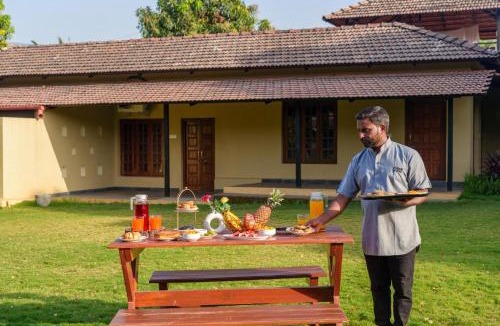 Mangaon Khurd Villa | StayVista's Basalt - with Mountain Views, Infinity Pool, Vintage Interiors, and Games Room