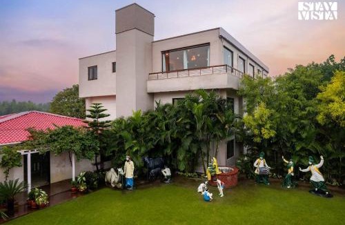 Landran Villa | StayVista's Casba Farm Retreat - Pet-Friendly Villa with Rooftop Lounge, Outdoor Pool, Lawn & Bar
