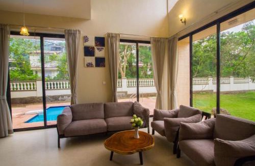 St.Stanislaus Villa Villa | StayVista's Greenwoods Villa 10 - City-Center Villa with Private Pool, Terrace, Lift & Carrom Board