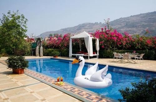 Kune Village Villa | StayVista's Le Sutra Great Escapes - 5BR - Geometrica - Artistic Rooms, Mountain View, Pool, and Gazebo Retreat