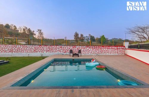 Bherav Villa | StayVista's Rustique Radiance - Hillside Retreat with Outdoor Pool & South Indian Architecture