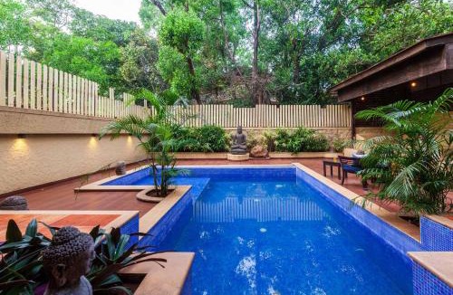 Kune Village Villa | StayVista's The Happy Hive - Cozy rooms and a pool for a delightful stay