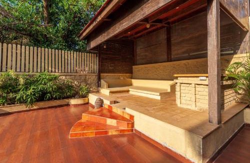 Kune Village Villa | StayVista's The Happy Hive - Cozy rooms and a pool for a delightful stay