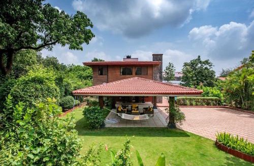 Kune N.m. Villa | StayVista's Woodstone Villa - Mountain Retreat with Heated Pool & Activities