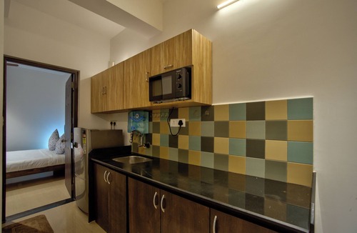 Vagator Apartment | Stylish 1BHK Vagator, Glass Wall