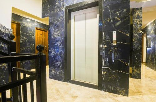 Holy Cross Colony Hotel | Super Hotel O Dabolim Near Goa International Airport