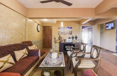 Holy Cross Colony Hotel | Super Hotel O Dabolim Near Goa International Airport