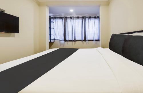 Holy Cross Colony Hotel | Super Hotel O Dabolim Near Goa International Airport
