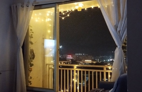 Mira Road East Apartment | The perchnOne cosy room with swimming pool and gym.