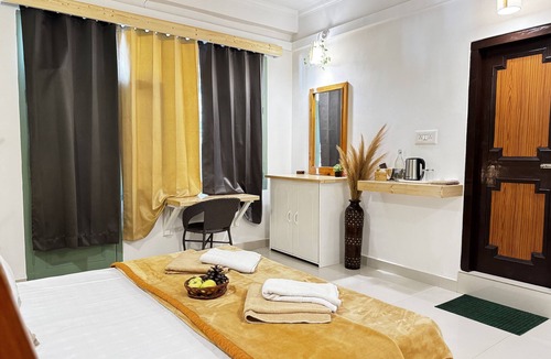 Bajaura Hotel | The Royal Orchard Kasol