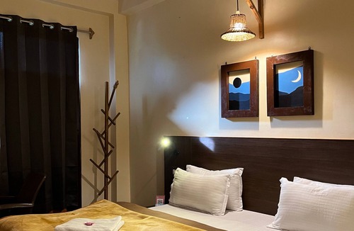 Bajaura Hotel | The Royal Orchard Kasol
