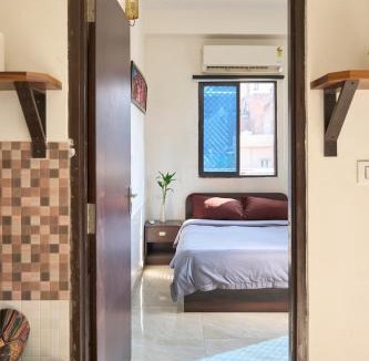 Lake Swaroop Sagar Apartment | TicAna Large 1Bedroom Living Kitchen with AC , fiber wifi Rooftop garden lake view
