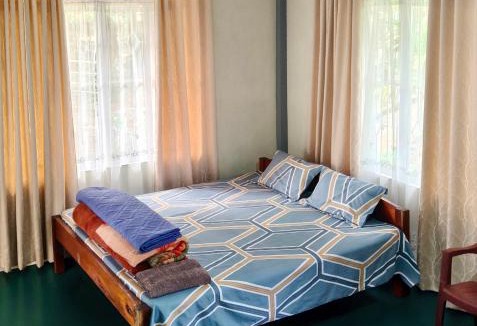 Mawlynnong House | Travellers Homestay Mawlynnong I Peaceful Nature Stay