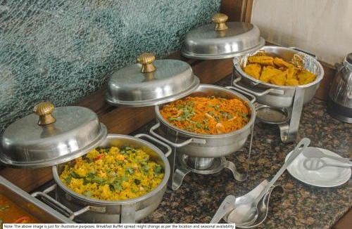 Nigdi Hotel | Treebo Malhaar Regency