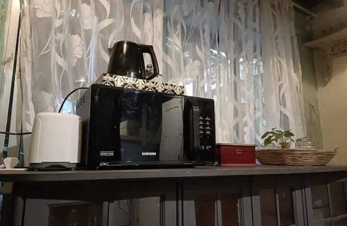 Versova Apartment | unique & a peaceful cottage with a green patio.