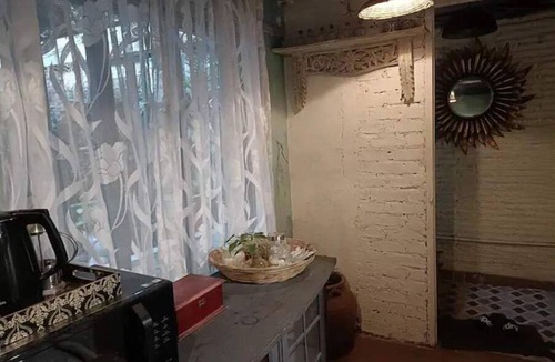 Versova Apartment | unique & a peaceful cottage with a green patio.