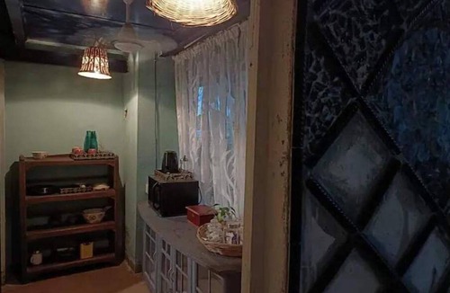 Versova Apartment | unique & a peaceful cottage with a green patio.