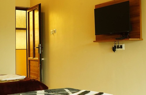 Valparai Hotel | Vasu Inn - Rooms in Valparai