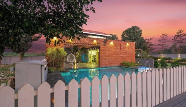 A beautiful & Green Farmhouse with a private Swimming pool & Garden .