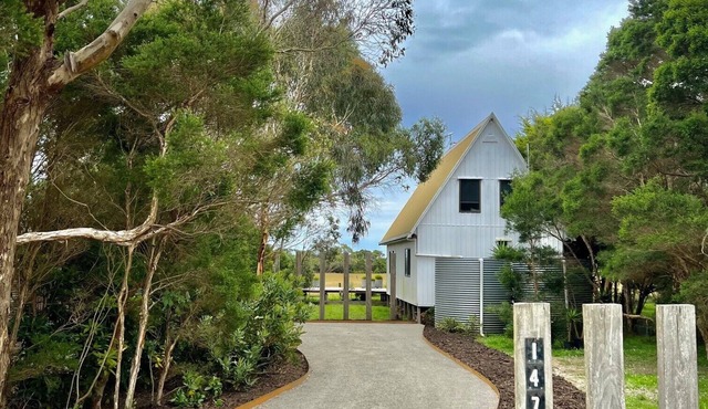 A shaped beach house located on the edge of Waratah Bay close Wilsons Promontory in Walkerville