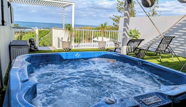 Beachfront, ocean views, private rooftop terrace with spa, pool, walk to beach in Marcoola