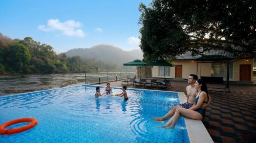 KANOVA Luxury Riverside Resort in Athirappilly