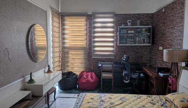 Luxury 1BHK in a green peaceful area with modern amenities and lawn area