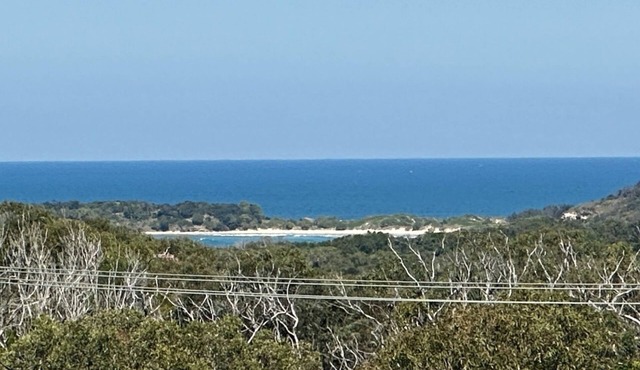 Spacious 5BR coastal retreat with ocean views, rumpus room, decks, boat parking in Evans Head