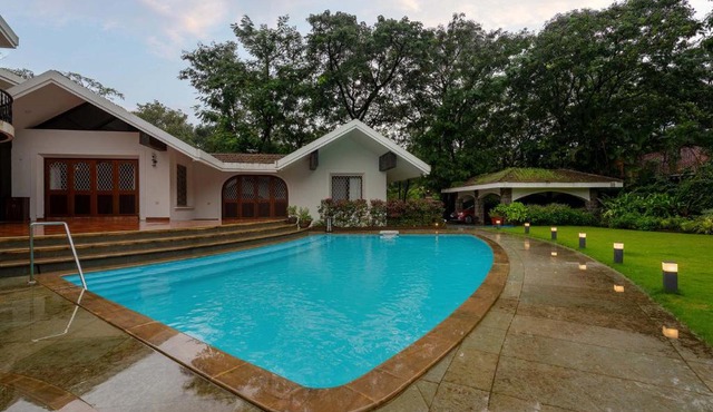 StayVista at Gulmohar Gardens with Gazebo, BBQ