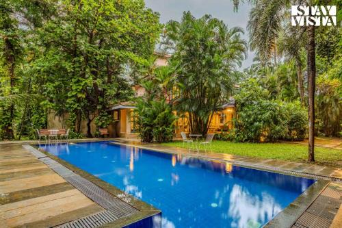 StayVista at Villa Nimaya with Lawn & Pool