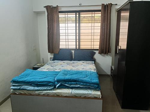 Baner House | Cozy Bedroom for Female Couple Family