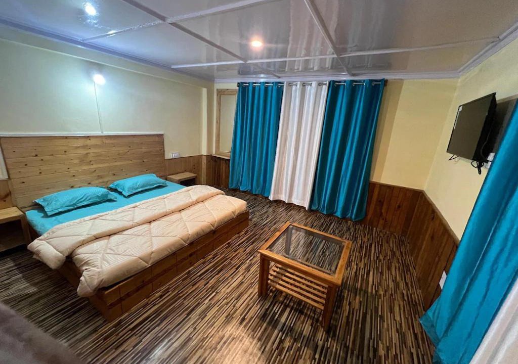 Vashist Hotel | Wander Nest Manali Luxurious rooms with mountain and river view