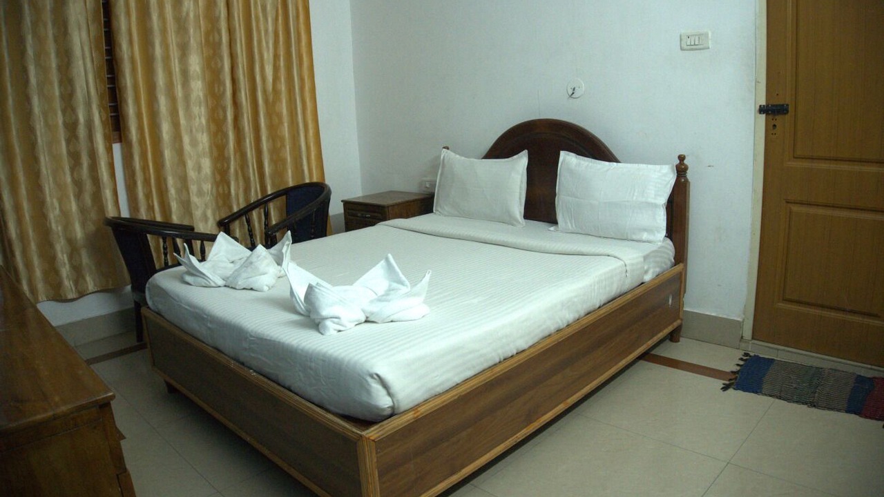 Photo of Bedroom in University of Kerala Senate House Campus