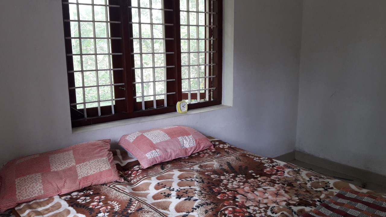 Photo of Bedroom in Irinjalakuda