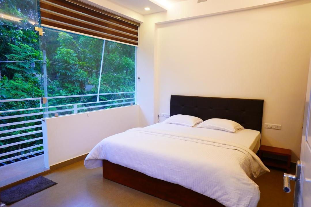 Photo of Bedroom in Irinjalakuda