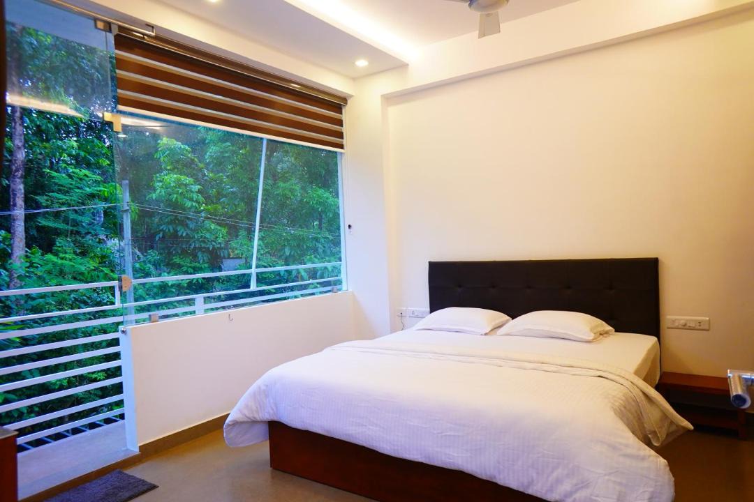 Photo of Bedroom in Irinjalakuda