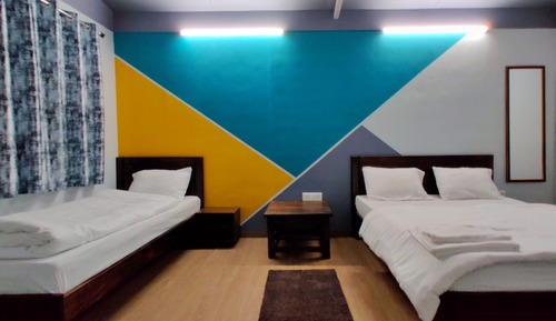 Triple Deluxe Bedroom (1 Double Bed +1 Single Bed)