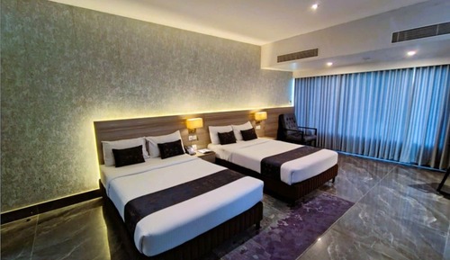 Deluxe Quadruple Room, City View