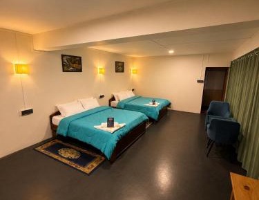 Quadruple Room with Private Bathroom