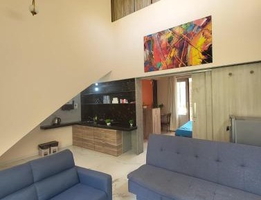 Four-Bedroom Apartment with Balcony 