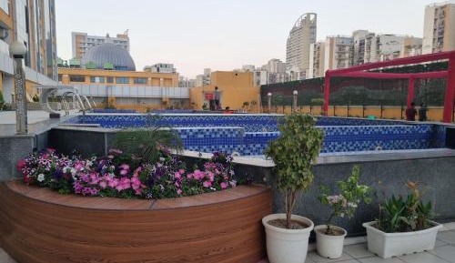 One-Bedroom Apartment with Balcony and City View