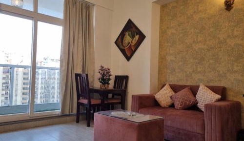 One-Bedroom Apartment with Balcony and City View