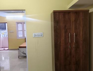 Single Bed in Dormitory Room