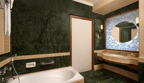 Deluxe Double Room with Garden View( 20% discount on food and soft beverages, 20% discount on Spa,Buy 1 get 1 on select brands at Madeira bar between 4 pm - 10 pm)eira bar between 4 pm - 10 pm)