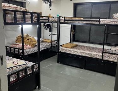 Single Bed in Dormitory Room
