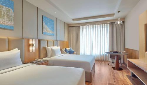 Deluxe Twin Room with INR 500/- credit on food & beverages per stay | 15% discount on spa & laundry | Happy Hour till 6pm 1+1 on IMFL and 2+1 on Beer