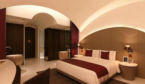 The Roseate Suite with Hi-Tea (16:30 to 17:30, Complimentary 30-min spa treatment (per stay for Mon to Thurs and 30% Discount on Spa Treatments on Fri to Sun) Pre Booking of Slot is mandatory, 15% disc on Laundry and Car Services, One Way Airport Transfer