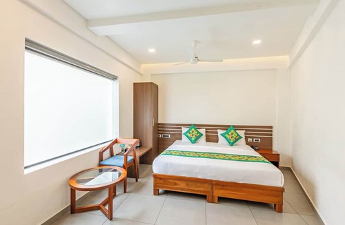 Thampanoor Hotel | Treebo De Cloud 9 Regency