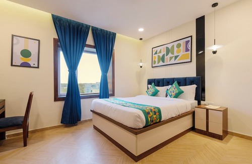 Jadupur Hotel | Treebo Premium Aasma Courtyard